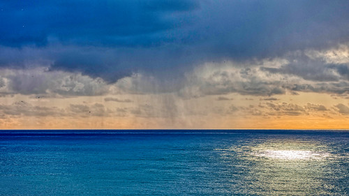 rain over the sea ©  Dmitry Karyshev