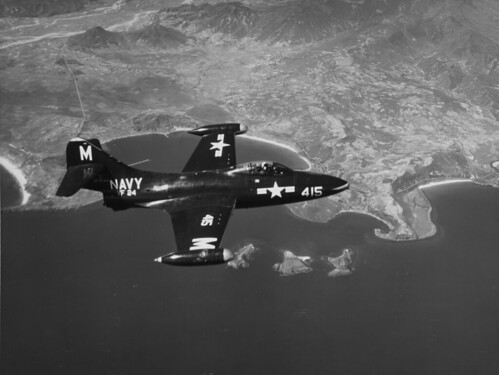 A U.S. Navy Grumman F9F-2 Panther (BuNo 123030) of VF-24 over Korea in June 1952 ©  Robert Sullivan