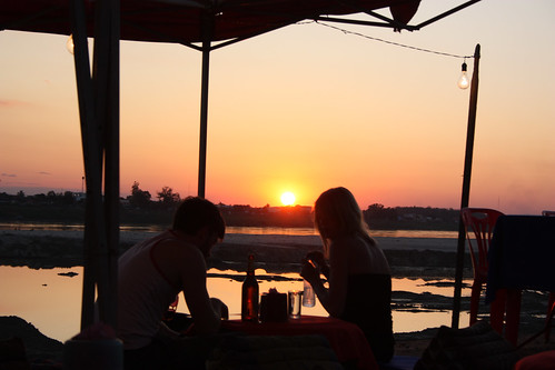 Watching the sun set on the Mekong River