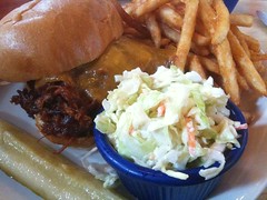 Pulled pork sandwich with beer fries