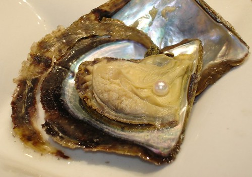 open oyster with pearl