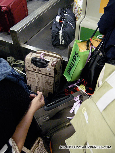 Checking in our luggage which has increased by a few extra pieces