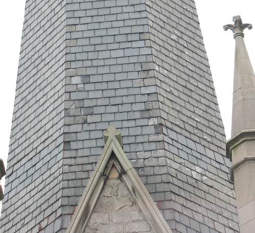 Deteriorating slate on the steeple