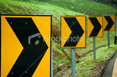ist2_9727148-winding-road-sign