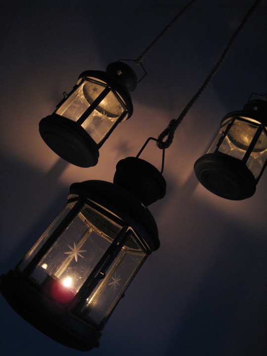 lanterns with tea lights reflecting