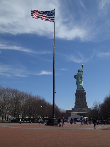 American flag and Statue of Liberty