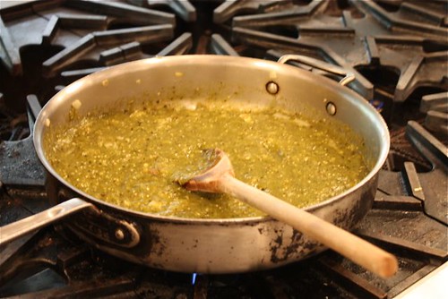 skillet on stove with chile verde cooking
