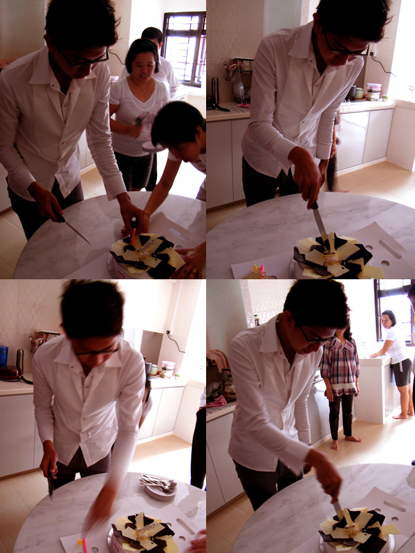 cousin cutting the swensen ice cream cake that we bought for him :)