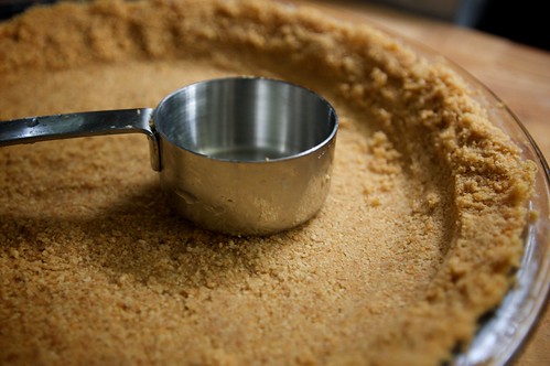 pushing crust into pie plate
