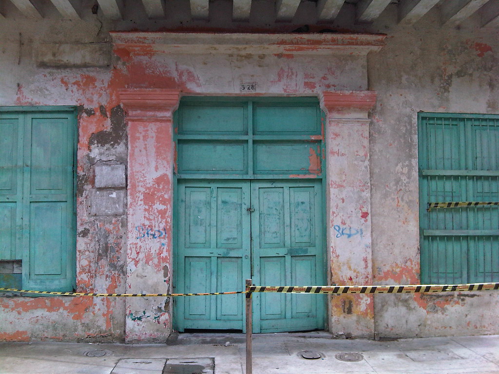 Weathered and worn down buildings await renovation throughout the city.
