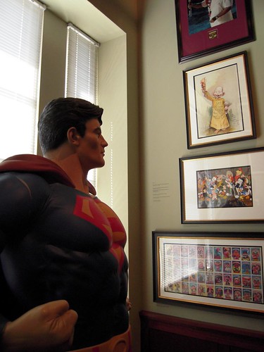 is it just me or does superman look like he's going to punch the yelow kid?