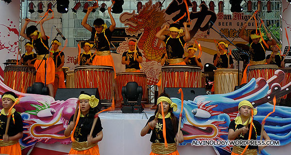 The drumming kids performing on stage