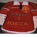 Birthday cake in the shape of a Manchester United football shirt.