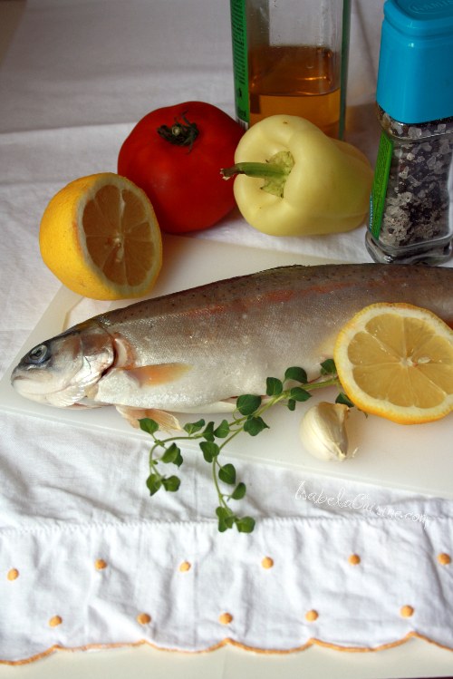 Baked trout with tomato and oregano
