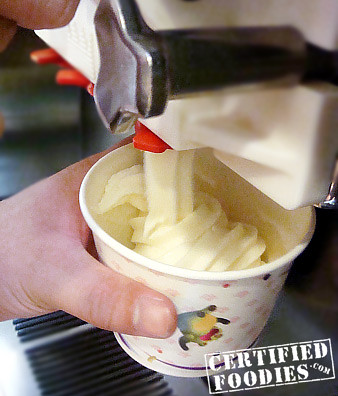 Pumping our Yogiberry Peach-flavored frozen yogurt - CertifiedFoodies.com