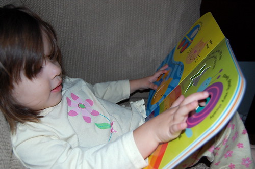 Reading her new Little Scholastic book