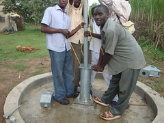 Msamaria Women Group-dropping of rising pipes during pump attachment.