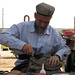 Man repairing shoe