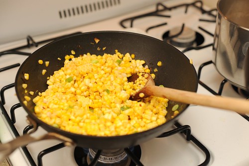 cooking the corn and the scallion whites