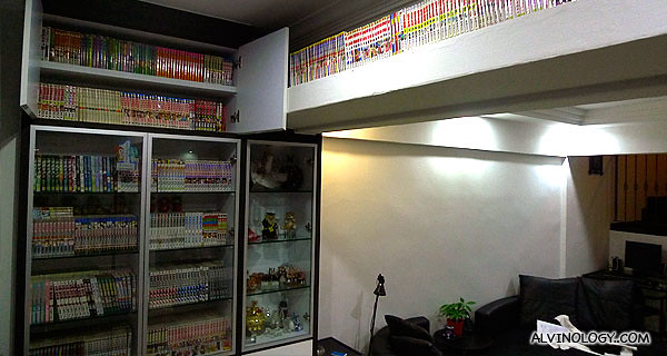 Shelves full of manga on the left too
