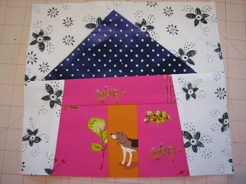 harry the hopeful hound lives in a pink house