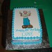 Rectangular 18th birthday cake with party character decoration.