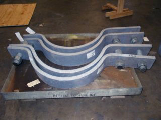 Pipe Shoes and Stand Assemblies for a Cross-Generating Station
