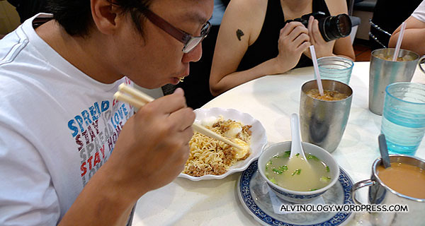 Ming Choy enjoying his noodle