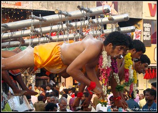 Garudan Thookkam (Eagle Hanging) is a ritual art form performed in Kali temples of south Kerala, south India. The people who dress up as Garuda perform the dance. After the dance performance, the hang-designate dangle from a shaft hooking the skin on his