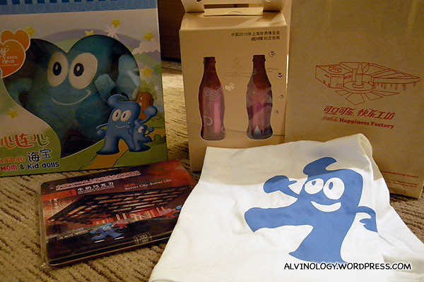 My Shanghai Expo spoils - a Haibao tee-shirt for Rachel, Haibao mom and son plush toy for my mom, chocolate for colleagues and a set of Coca-Cola Shanghai Expo collectible bottles for keepsake