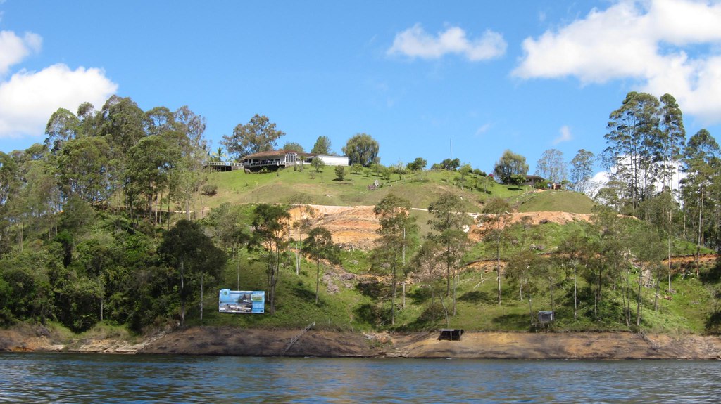 The home atop this hill belonged to the head of the Cali Cartel, one of Pablo Escobar's archenemies. The billboard below advertises a new high-end real estate development being built there.