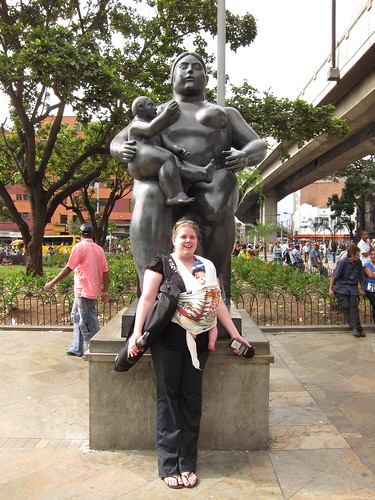 Christine and Cole pose in front of a Fernando Botero sculpture.