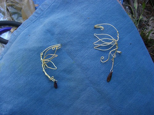 Ear cuffs with multiple, layered leaf shapes