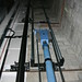 Roped hydraulic piston lowered at ground floor