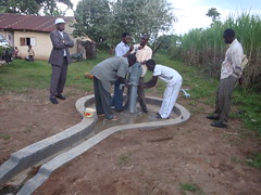 Msamaria women Group-attachment of water tank during pump attachment.