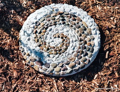 Big Pebble Spiral Stepping Stone by Margaret Almon.