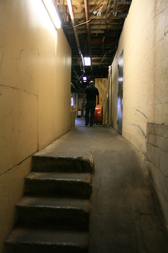 Unusual stair ramp combination in back hallway