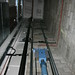 Roped hydraulic elevator piston