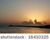 stock-photo-dramatic-sunbeams-over-the-harbor-of-city-of-zonguldak-turkey-16410325