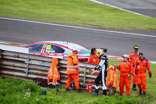 Tom Ingram walks away from his stricken car off the track at Oulton Park, May 2017