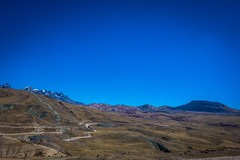 Rolling fields, glaciers and the ever present winding road in the Andes.