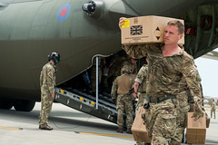 Royal Marine unloads aid in the Turks and Caicos Islands