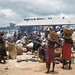 Owari females with baskets of calabashes. Vultures. Kaduna. Market. Nigeria.
