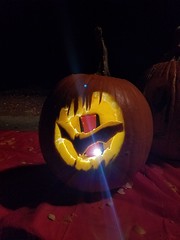 10-21-2017: The clever millennial illuminates her pumpkin with her smartphone
