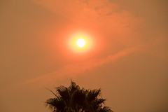 2017-342 Afternoon Sun Through Thomas Fire Haze