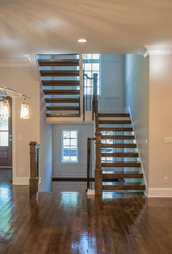 Contemporary stair with no risers. Box newel posts. Built and installed by #thestairguys #andronxStairs