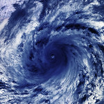 Climate change is causing more frequent and severe monsoons, floods, droughts, and other extreme weather events around the world. Shown here: a tropical cyclone. Original from NASA. Digitally enhanced by rawpixel.