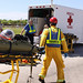 Volunteers portraying astronauts are transported to ambulances as part of a Mode II-IV evacuation simulation exercise at NASA Kennedy Space Center&#39;s Launch Pad 39A, which conducted by The Space Shuttle Program and U.S. Air Force. Original from NASA. D