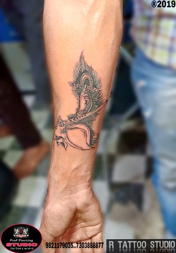 Krishna name tattoo with flute and feather  shri krishna tattoo  YouTube